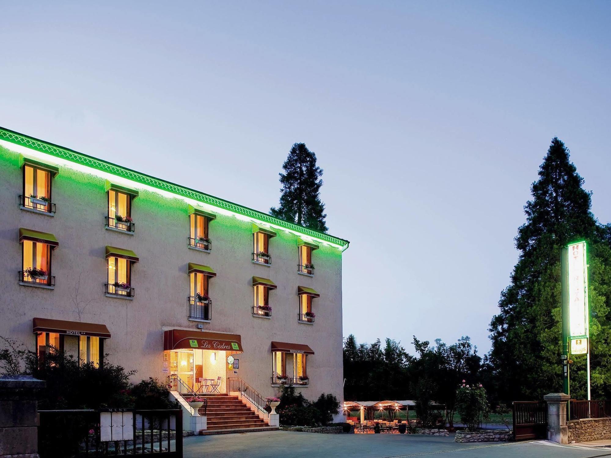 Logis Hotel Restaurant Les Cedres Joyeuse Bagian luar foto